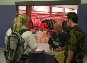 Expedition clothing window with hundreds of parkas in the background