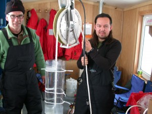 Mak and Jeff prepare to lower a sediment trap