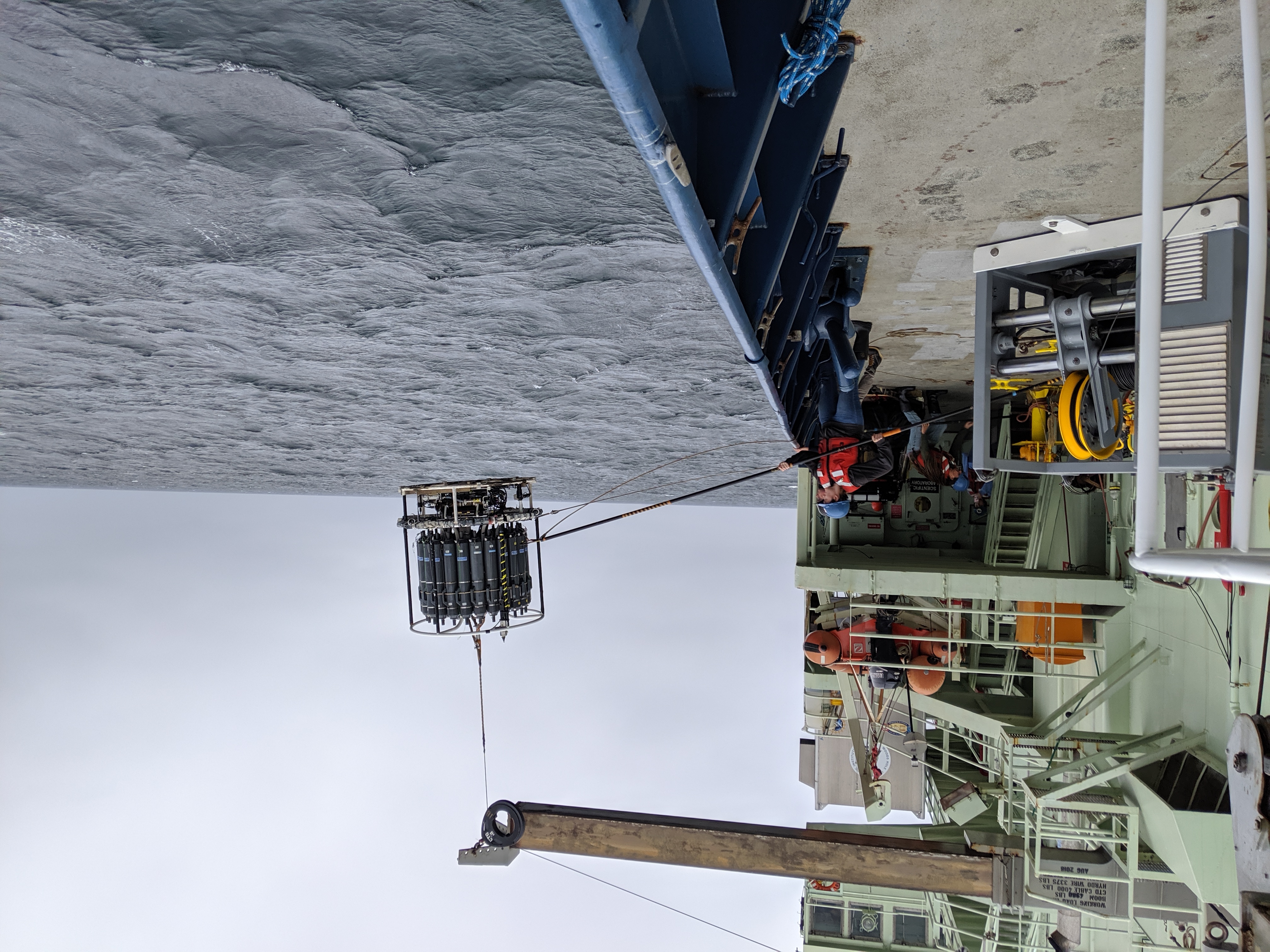 JCVI and Scripps scientists recovering the ship’s main CTD rosette to gather other measurements during the cruise.